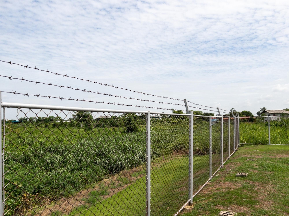 Barbed Wire Fence Installation